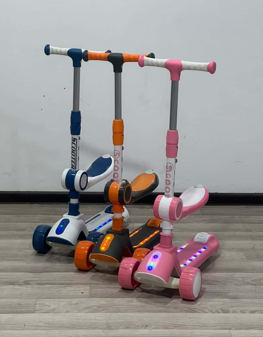 Children's scooter with seat, lights, and music - Tenderyard