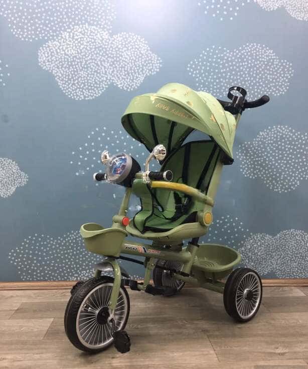 Children's tricycle with umbrella, lights, and music - Tenderyard