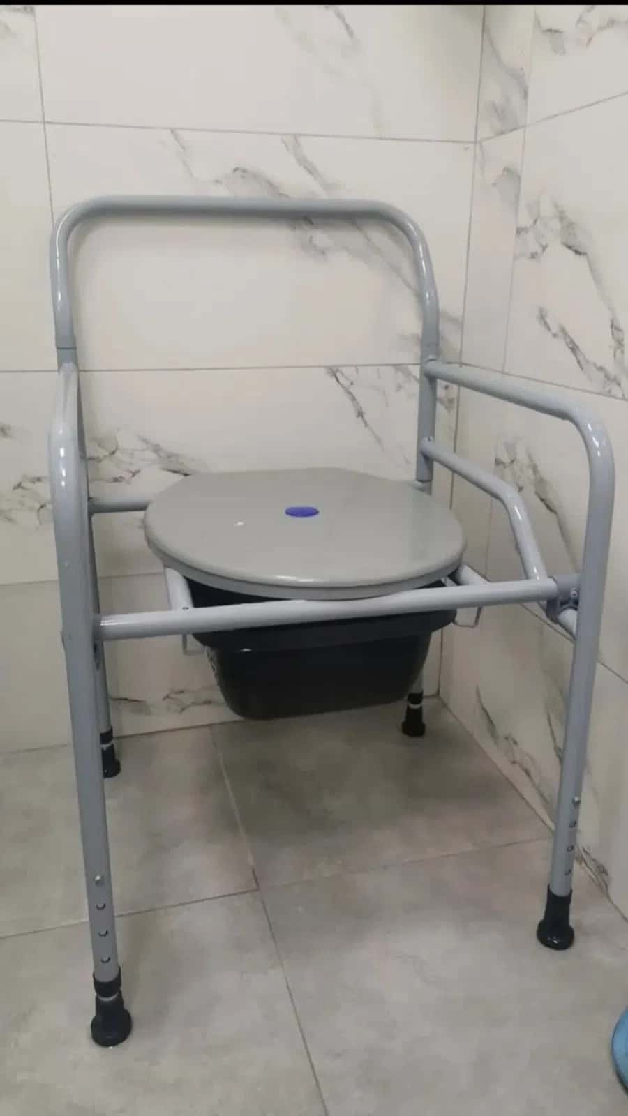 Height-adjustable commode chair for patients - Tenderyard