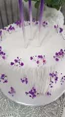 Birthday cake with purple flower decor - Tenderyard