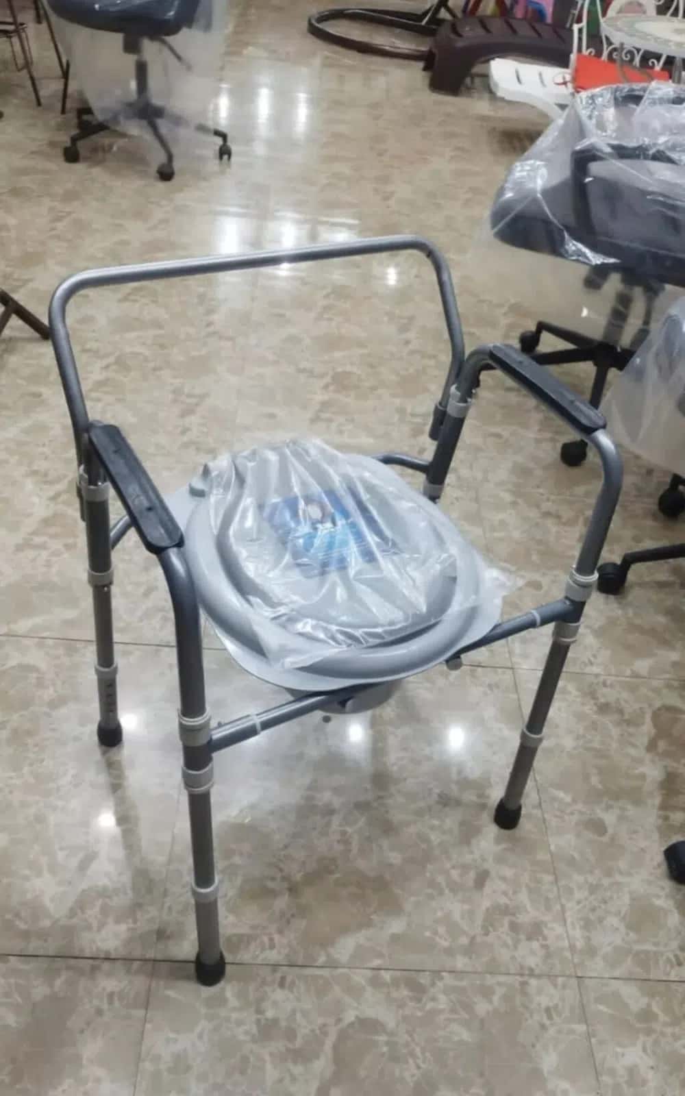 Folding sanitary commode chair for disabled and patients - Tenderyard