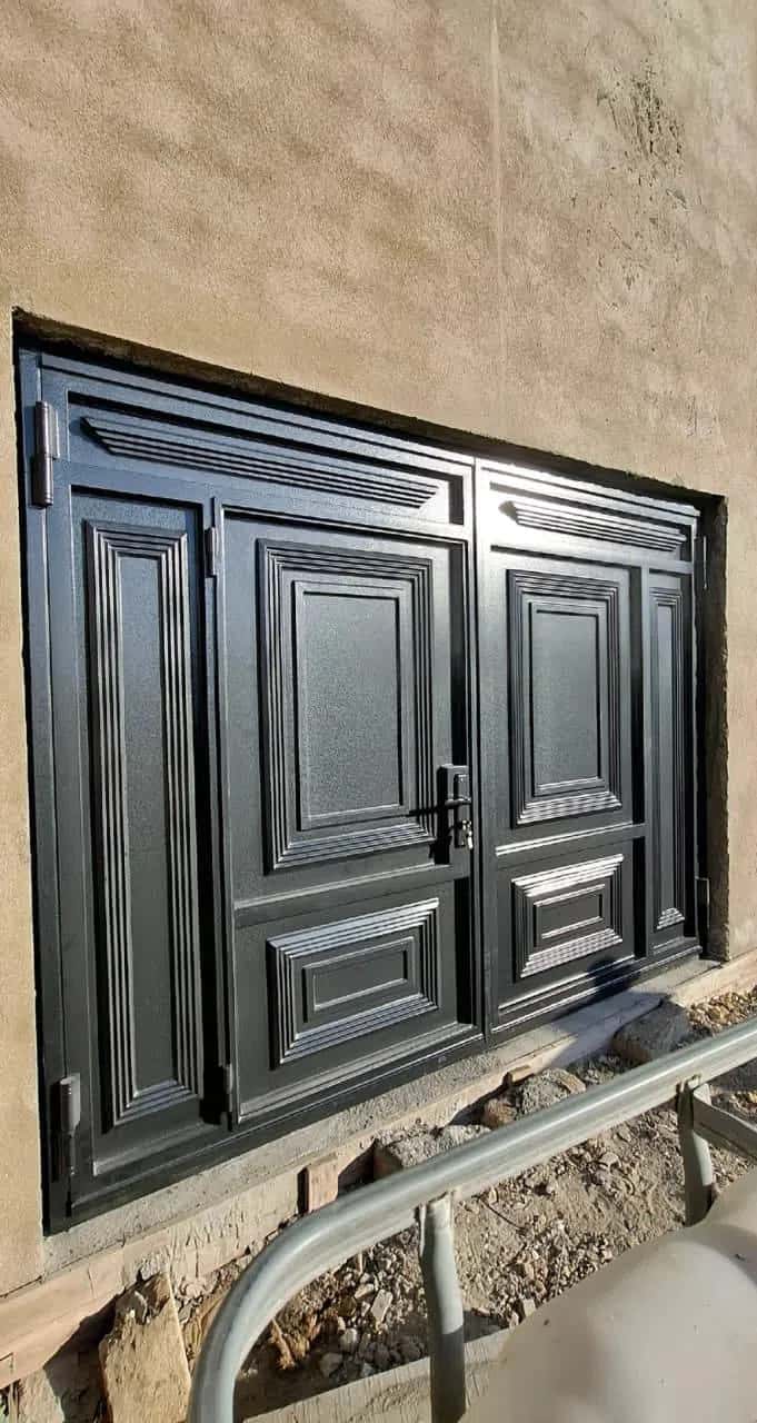 Iron garage door - Tenderyard