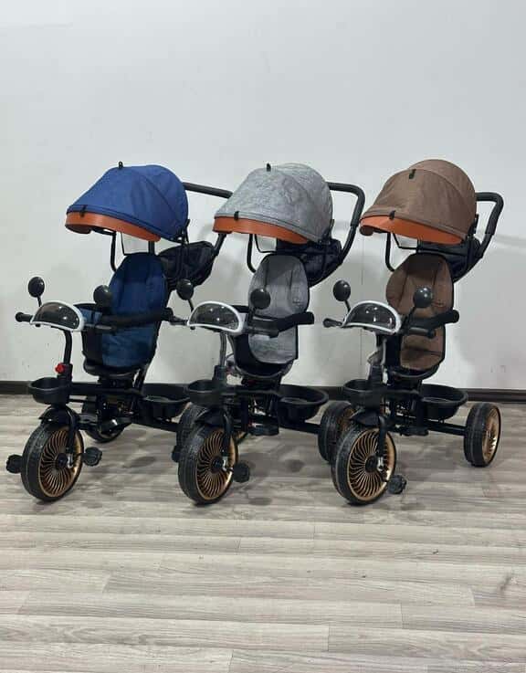 Children's tricycle with umbrella, lights, and music - Tenderyard