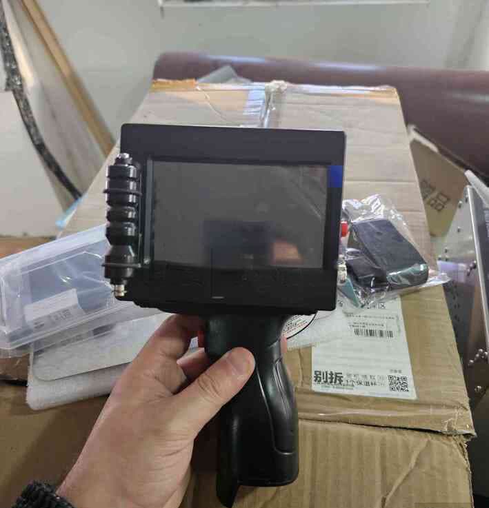 Əl ilə idarə olunan portativ tarix və barkod printeri